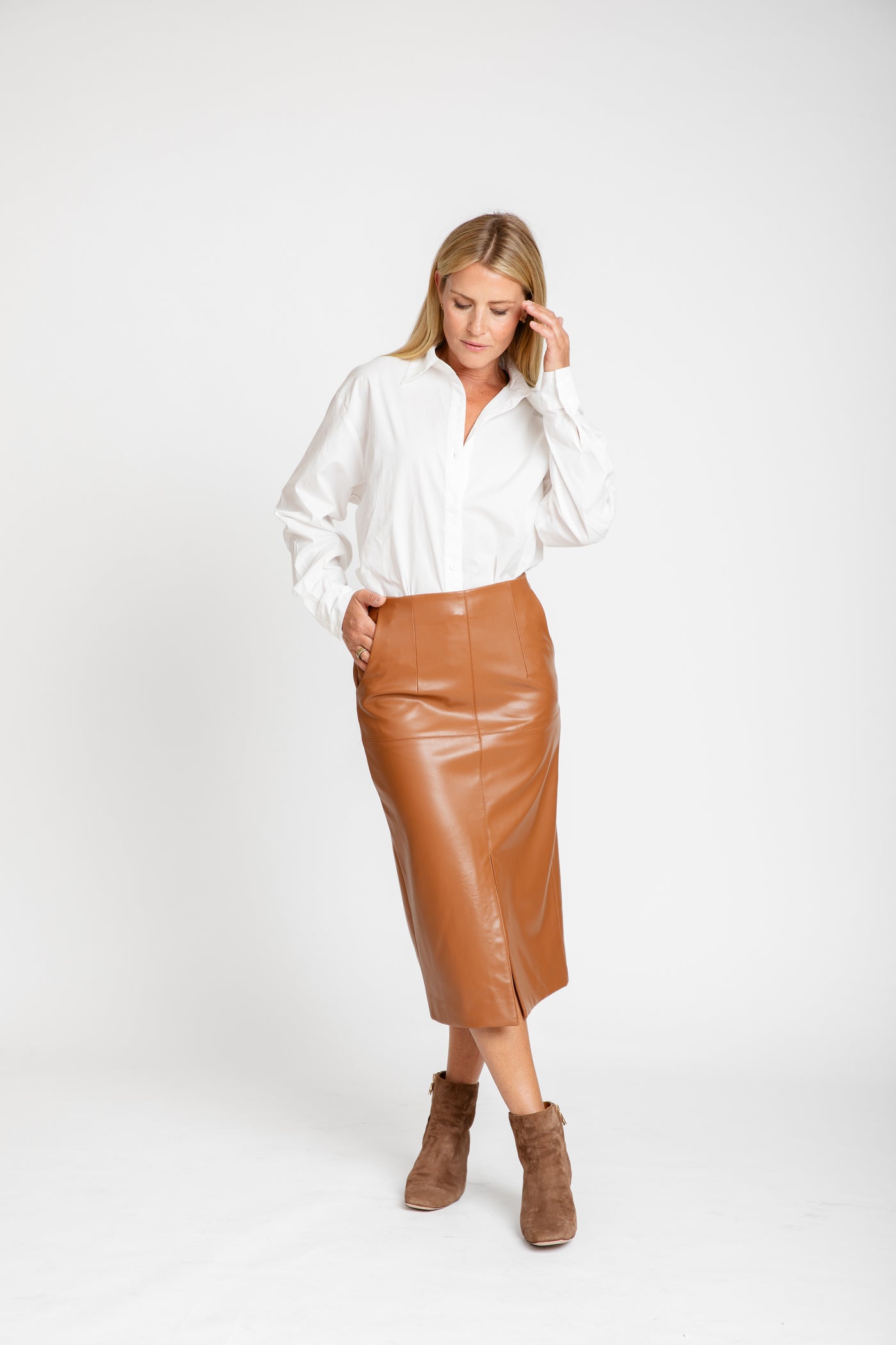 The Ava Vegan Leather Pencil Skirt in Caramel Burgess Sweaters